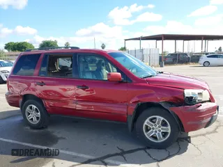 2005 Honda Pilot EX-L with VIN 2HKYF18545H544535, listed as a IAAI auction lot 42250692 with 232,994 mi miles and . Bid and sale history available at DreamBid. Image 13.