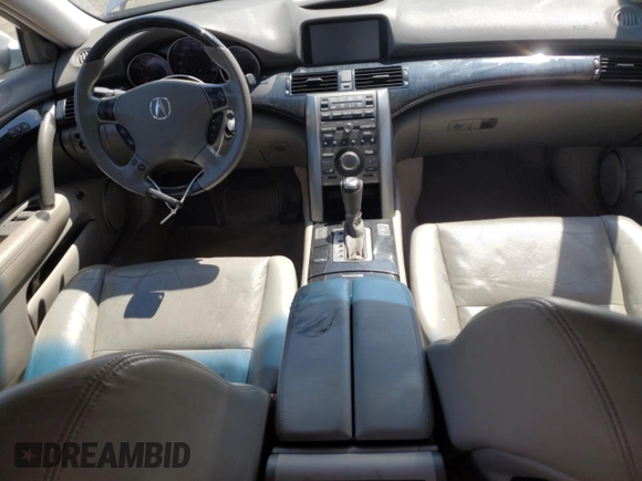 2010 Acura RL Technology with VIN JH4KB2F61AC001845, listed as a Copart auction lot 52549445 with 150,435 mi miles and Salvage Title. Bid and sale history available at DreamBid. Image 8.
