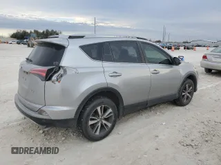 2018 Toyota RAV4 XLE with VIN JTMWFREV3JJ180152, listed as a Copart auction lot 46949465 with 103,346 mi miles and Clean Title. Bid and sale history available at DreamBid. Image 3.