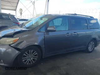 2011 Toyota Sienna XLE AAS with VIN 5TDYK3DC5BS146848, listed as a IAAI auction lot 41914140 with 259,862 mi miles. Bid and sale history available at carsss.com. Image 14.