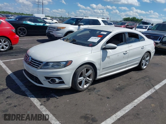 2014 Volkswagen CC R-Line with VIN WVWBP7AN7EE501064, listed as a IAAI auction lot 42220870 with Not provided miles and . Bid and sale history available at DreamBid. Image 2.