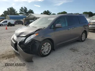 2011 Toyota Sienna XLE AAS with VIN 5TDYK3DC2BS145513, listed as a Copart auction lot 58214575 with 169,083 mi miles and Salvage title. Bid and sale history available at DreamBid. Image 1.