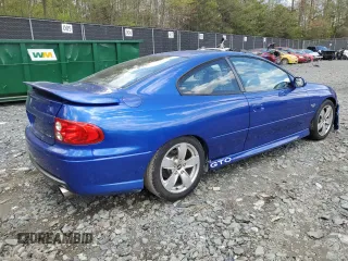 2005 Pontiac GTO z VIN 6G2VX12U55L432796, wystawiony jako Copart lot #53055995 z przebiegiem 147 253 mil mil oraz Szkody całkowita. Historia ofert i sprzedaży dostępna na DreamBid. Obrazek 3.