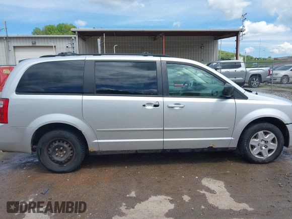 2009 Dodge Grand Caravan SE z VIN 1D8HN44E09B516847, wystawiony jako IAAI lot #42222476 z przebiegiem 190 090 mil mil oraz . Historia ofert i sprzedaży dostępna na DreamBid. Obrazek 14.