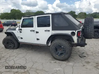 2015 Jeep Wrangler Unlimited Sport с VIN 1C4BJWDG3FL570131, выставлен на аукционе Copart как лот 64418415 с пробегом 112 362 миль миль и Списание • Salvage title. История ставок и продаж доступна на DreamBid. Изображение 2.