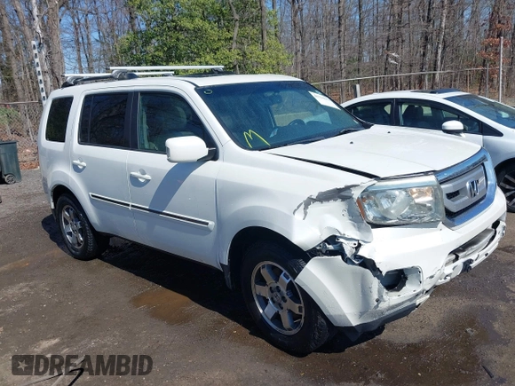 2011 Honda Pilot Touring with VIN 5FNYF4H96BB014095, listed as a IAAI auction lot 41794052 with 202,440 mi miles and . Bid and sale history available at DreamBid. Image 1.