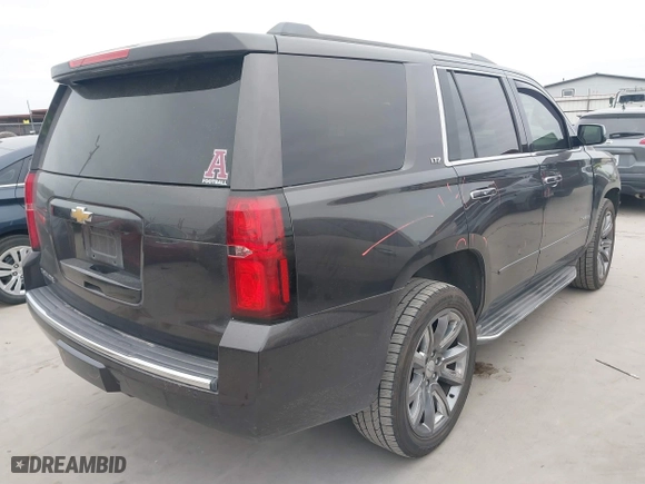 2015 Chevrolet Tahoe LTZ with VIN 1GNSCCKC6FR262769, listed as a IAAI auction lot 41389535 with 196,767 mi miles. Bid and sale history available at carsss.com. Image 4.