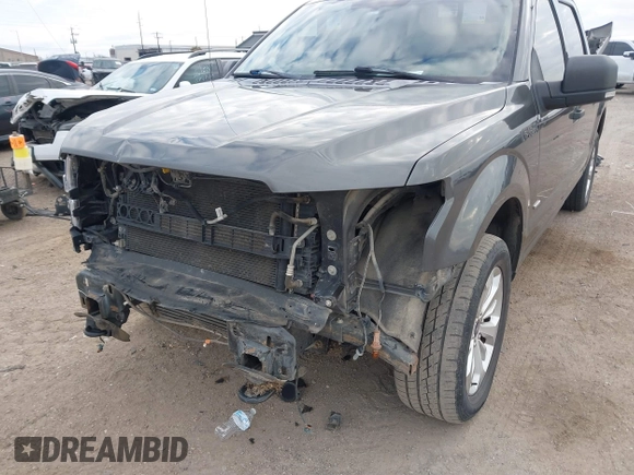 2015 Ford F-150 XLT with VIN 1FTEW1EGXFFA08354, listed as a IAAI auction lot 41627569 with 125,940 mi miles and . Bid and sale history available at DreamBid. Image 6.