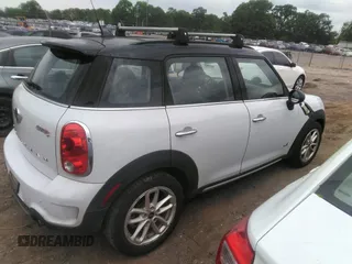 2015 MINI Cooper Countryman S with VIN WMWZC5C51FWP48214, listed as a IAAI auction lot 42102174 with 181,917 mi miles. Bid and sale history available at carsss.com. Image 4.