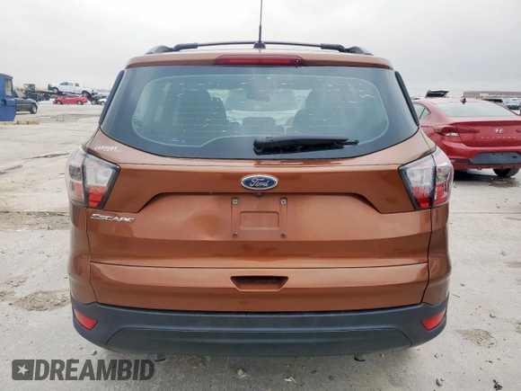 2017 Ford Escape S with VIN 1FMCU0F78HUA80539, listed as a Copart auction lot 57485415 with 131,734 mi miles and Salvage title. Bid and sale history available at DreamBid. Image 6.