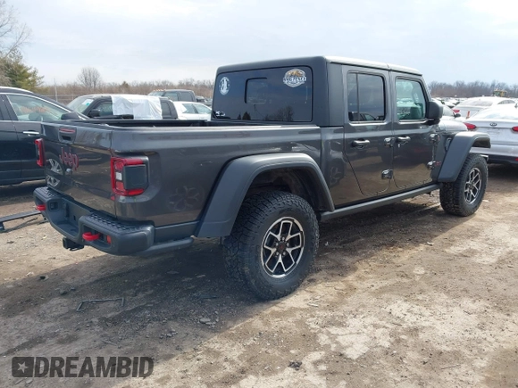 2024 Jeep Gladiator Rubicon z VIN 1C6JJTBG5RL110669, wystawiony jako IAAI lot #41694630 z przebiegiem 1 189 mil mil oraz . Historia ofert i sprzedaży dostępna na DreamBid. Obrazek 4.
