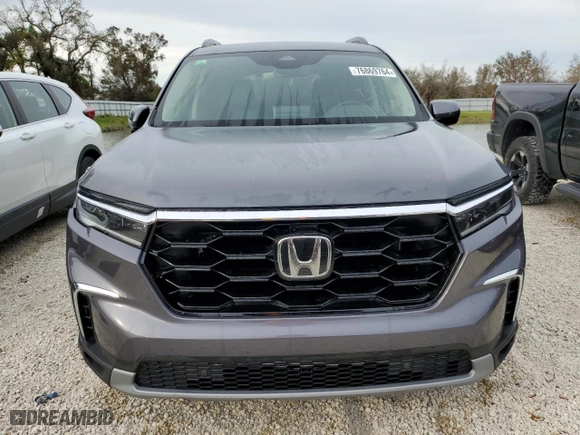 2025 Honda Pilot Touring with VIN 5FNYG2H75SB002553, listed as a Copart auction lot 76869764 with 7,426 mi miles and Salvage Title. Bid and sale history available at carsss.com. Image 5.
