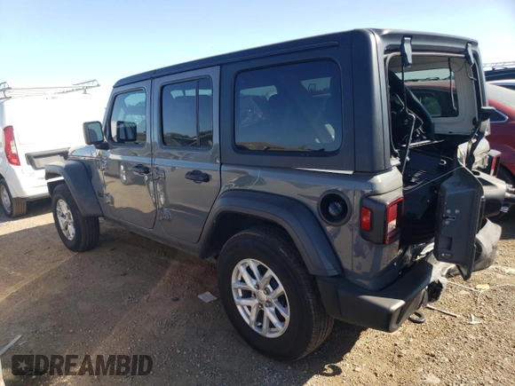 2023 Jeep Wrangler Sport with VIN 1C4HJXDN1PW701944, listed as a Copart auction lot 69973104 with 24,733 mi miles and Salvage Title. Bid and sale history available at DreamBid. Image 2.
