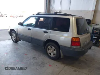 2000 Subaru Forester L with VIN JF1SF6350YH716384, listed as a IAAI auction lot 42809829 with 238,817 mi miles and . Bid and sale history available at DreamBid. Image 3.