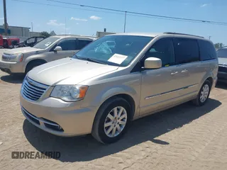 2014 Chrysler Town & Country Touring with VIN 2C4RC1BG3ER418600, listed as a IAAI auction lot 42132277 with 72,406 mi miles and . Bid and sale history available at DreamBid. Image 2.