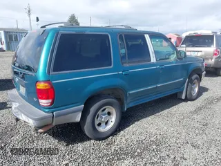 1998 Ford Explorer XL z VIN 1FMZU34E9WZA08004, wystawiony jako IAAI lot #41899669 z przebiegiem 209 832 mil mil oraz . Historia ofert i sprzedaży dostępna na DreamBid. Obrazek 4.