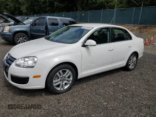 2009 Volkswagen Jetta with VIN 3VWAL71K59M058195, listed as a Copart auction lot 63673605 with 122,000 mi miles and Salvage title. Bid and sale history available at DreamBid. Image 1.