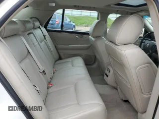 2011 Cadillac DTS Luxury Collection z VIN 1G6KD5E67BU122196, wystawiony jako Copart lot #58716175 z przebiegiem 76 192 mil mil oraz Czysty tytuł • Clean title. Historia ofert i sprzedaży dostępna na DreamBid. Obrazek 10.