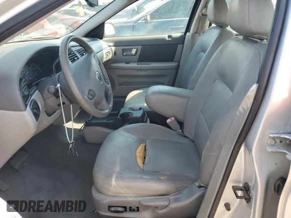2002 Mercury Sable LS z VIN 1MEHM55SX2A619019, wystawiony jako Copart lot #74205254 z przebiegiem 71 677 mil mil oraz Szkody całkowita. Historia ofert i sprzedaży dostępna na DreamBid. Obrazek 7.