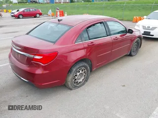 2012 Chrysler 200 LX with VIN 1C3CCBAB5CN200089, listed as a IAAI auction lot 42078609 with 114,384 mi miles and . Bid and sale history available at carsss.com. Image 4.