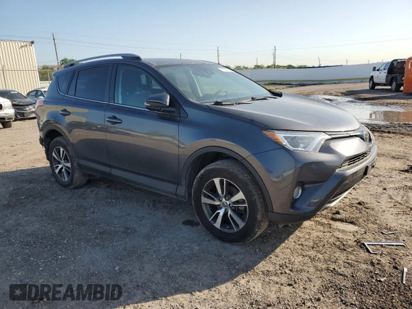 2018 Toyota RAV4 XLE with VIN 2T3WFREV0JW517488, listed as a Copart auction lot 51000975 with 68,105 mi miles and Salvage title. Bid and sale history available at DreamBid. Image 4.