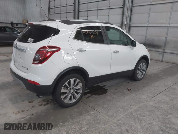 2018 Buick Encore Preferred with VIN KL4CJESB7JB596133, listed as a IAAI auction lot 41085078 with 99,000 mi miles. Bid and sale history available at carsss.com. Image 4.