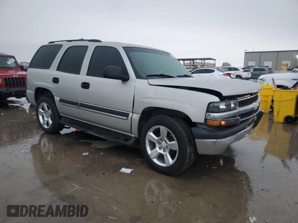 2004 Chevrolet Tahoe LS with VIN 1GNEC13Z24R310768, listed as a Copart auction lot 55886055 with 246,093 mi miles and Salvage title. Bid and sale history available at DreamBid. Image 4.