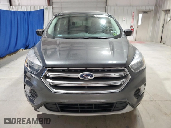 2017 Ford Escape SE with VIN 1FMCU9GD9HUC37830, listed as a Copart auction lot 52599485 with 105,088 mi miles and Clean Title. Bid and sale history available at DreamBid. Image 5.
