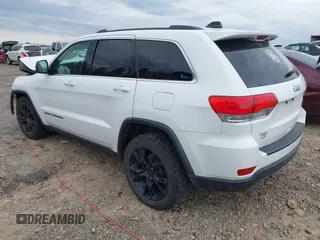 2018 Jeep Grand Cherokee Laredo E with VIN 1C4RJEAG7JC322888, listed as a IAAI auction lot 41756833 with 129,988 mi miles and . Bid and sale history available at DreamBid. Image 3.