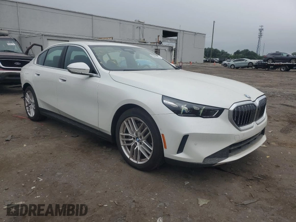 2024 BMW 5 Series 540i xDrive with VIN WBA63FJ01RCR67129, listed as a Copart auction lot 62095995 with 5,075 mi miles and Salvage title. Bid and sale history available at DreamBid. Image 4.