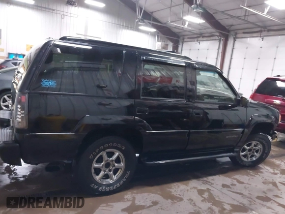 2000 GMC Denali with VIN 1GKEK13R9YR163824, listed as a IAAI auction lot 41245808 with 206,773 mi miles. Bid and sale history available at carsss.com. Image 13.