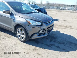 2013 Ford Escape SEL with VIN 1FMCU9H93DUA72572, listed as a IAAI auction lot 41633096 with 190,816 mi miles. Bid and sale history available at carsss.com. Image 6.