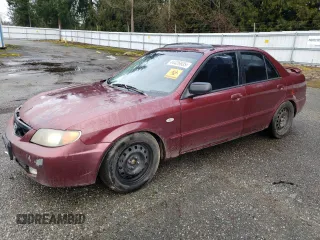 2003 Mazda Protege DX with VIN JM1BJ226231137913, listed as a Copart auction lot 44426935 with 237,221 mi miles and Salvage Title. Bid and sale history available at DreamBid. Image 1.