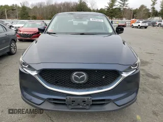 2018 Mazda CX-5 Touring with VIN JM3KFBCM9J0433729, listed as a Copart auction lot 49945515 with 143,064 mi miles and Salvage Title. Bid and sale history available at carsss.com. Image 5.