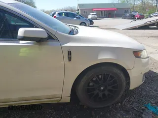 2010 Lincoln MKS w/EcoBoost with VIN 1LNHL9FT3AG611242, listed as a IAAI auction lot 42142027 with 103,758 mi miles. Bid and sale history available at carsss.com. Image 17.