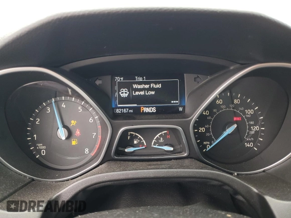 2016 Ford Focus SE z VIN 1FADP3F23GL405565, wystawiony jako Copart lot #60173935 z przebiegiem 82 167 mil mil oraz Szkoda całkowita • Salvage title. Historia ofert i sprzedaży dostępna na DreamBid. Obrazek 9.
