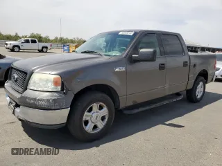 2004 Ford F-150 XLT with VIN 1FTRW12W74KC26169, listed as a Copart auction lot 68393914 with 118,059 mi miles and Salvage Title. Bid and sale history available at DreamBid. Image 1.