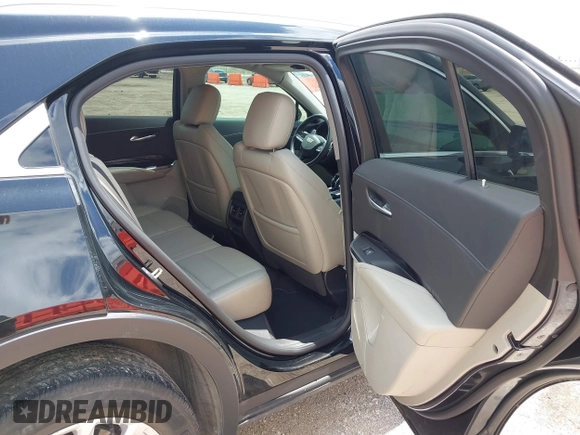 2020 Cadillac XT4 FWD Luxury z VIN 1GYAZAR4XLF146598, wystawiony jako IAAI lot #42211317 z przebiegiem 37 313 mil mil oraz . Historia ofert i sprzedaży dostępna na DreamBid. Obrazek 8.