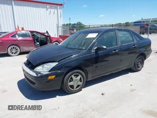 2003 Ford Focus SE with VIN 1FAFP34P83W150783, listed as a IAAI auction lot 42319653 with Not provided miles and . Bid and sale history available at DreamBid. Image 2.