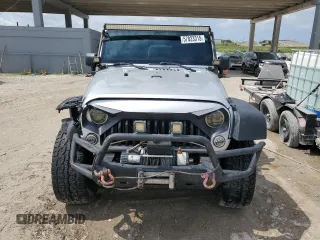 2012 Jeep Wrangler Unlimited Sport z VIN 1C4BJWDG8CL220960, wystawiony jako Copart lot #57823315 z przebiegiem 177 541 mil mil oraz Szkoda całkowita • Salvage title. Historia ofert i sprzedaży dostępna na DreamBid. Obrazek 5.