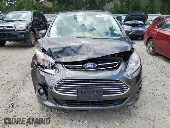 2016 Ford C-Max Energi SEL with VIN 1FADP5CU4GL112498, listed as a Copart auction lot 58612914 with 106,069 mi miles and Salvage Title. Bid and sale history available at carsss.com. Image 5.