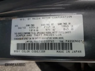 2010 Mazda 3 S Grand Touring with VIN JM1BL1S62A1350765, listed as a Copart auction lot 62418585 with 146,930 mi miles and Salvage title. Bid and sale history available at DreamBid. Image 12.