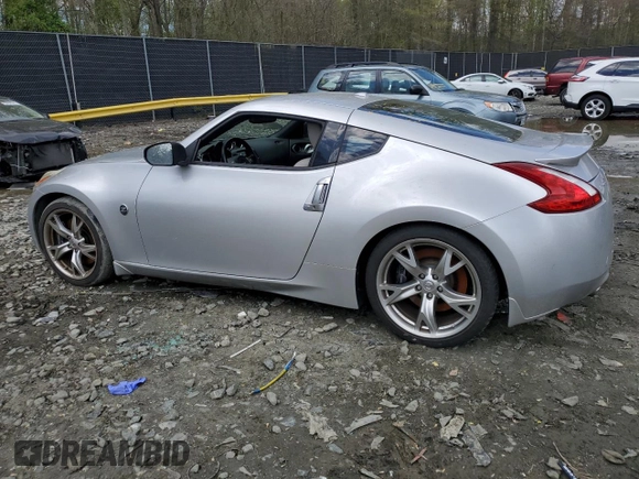 2010 Nissan 370Z with VIN JN1AZ4EH6AM505621, listed as a Copart auction lot 52745505 with 107,660 mi miles and Salvage Title. Bid and sale history available at carsss.com. Image 2.