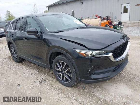 2018 Mazda CX-5 Grand Touring with VIN JM3KFBDM3J0384431, listed as a IAAI auction lot 42013474 with 65,018 mi miles. Bid and sale history available at carsss.com. Image 1.