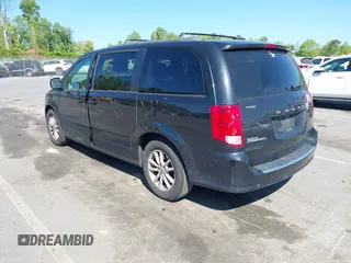 2014 Dodge Grand Caravan SXT with VIN 2C4RDGCG4ER341699, listed as a IAAI auction lot 42064523 with 234,422 mi miles and . Bid and sale history available at DreamBid. Image 3.