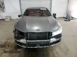 2017 BMW 7 Series 750i with VIN WBA7F0C31HGM22359, listed as a Copart auction lot 56306875 with 90,642 mi miles and Salvage title. Bid and sale history available at DreamBid. Image 5.