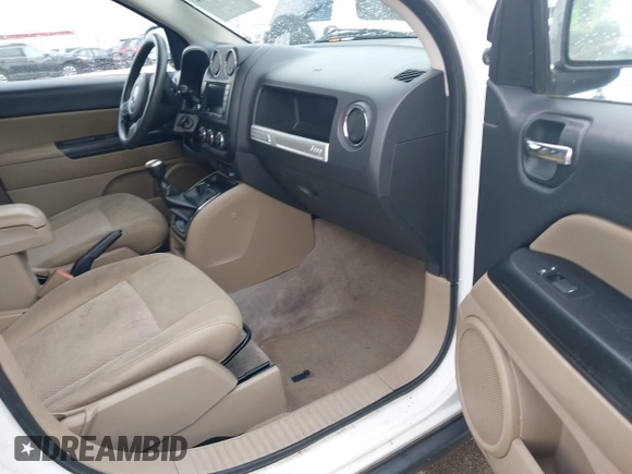 2014 Jeep Compass Altitude with VIN 1C4NJCBA8ED606589, listed as a IAAI auction lot 41939914 with 148,281 mi miles. Bid and sale history available at carsss.com. Image 5.