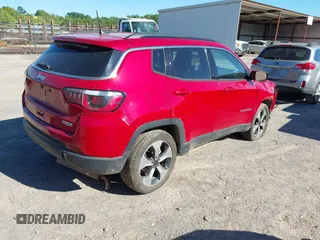 2017 Jeep Compass Latitude with VIN 3C4NJDBBXHT666614, listed as a IAAI auction lot 42318108 with 79,413 mi miles and . Bid and sale history available at DreamBid. Image 4.