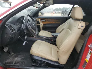 2009 BMW 1 Series 128i with VIN WBAUL73509VJ75919, listed as a Copart auction lot 83335344 with 185,219 mi miles and Salvage Title. Bid and sale history available at DreamBid. Image 7.