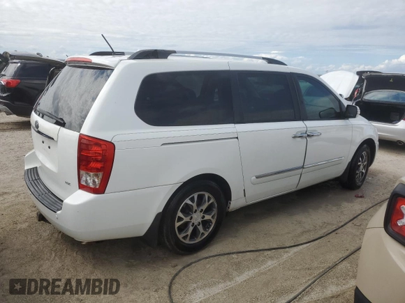 2014 Kia Sedona EX with VIN KNDMH4C70E6568487, listed as a Copart auction lot 74682134 with 69,977 mi miles and Salvage Title. Bid and sale history available at carsss.com. Image 3.